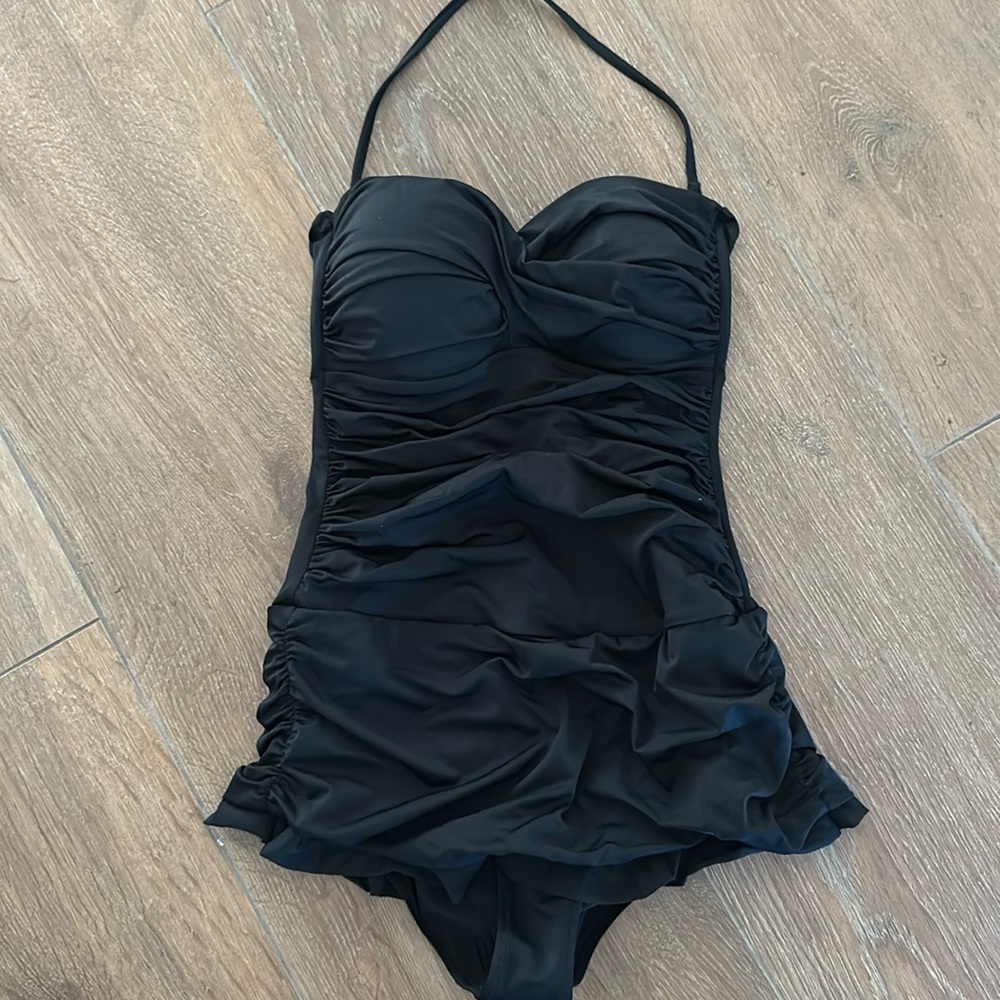 Women's swimsuit. Tags removed but fits large size 12-14.